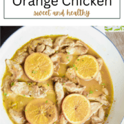 Slices of tender chicken coated in a glossy orange sauce, topped with sesame seeds and fresh orange slices, served over a bed of cauliflower rice.