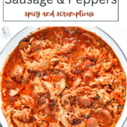 A white skillet filled with sliced andouille sausage, shredded chicken, and vibrant red, yellow, and green bell peppers in a savory Cajun tomato sauce.
